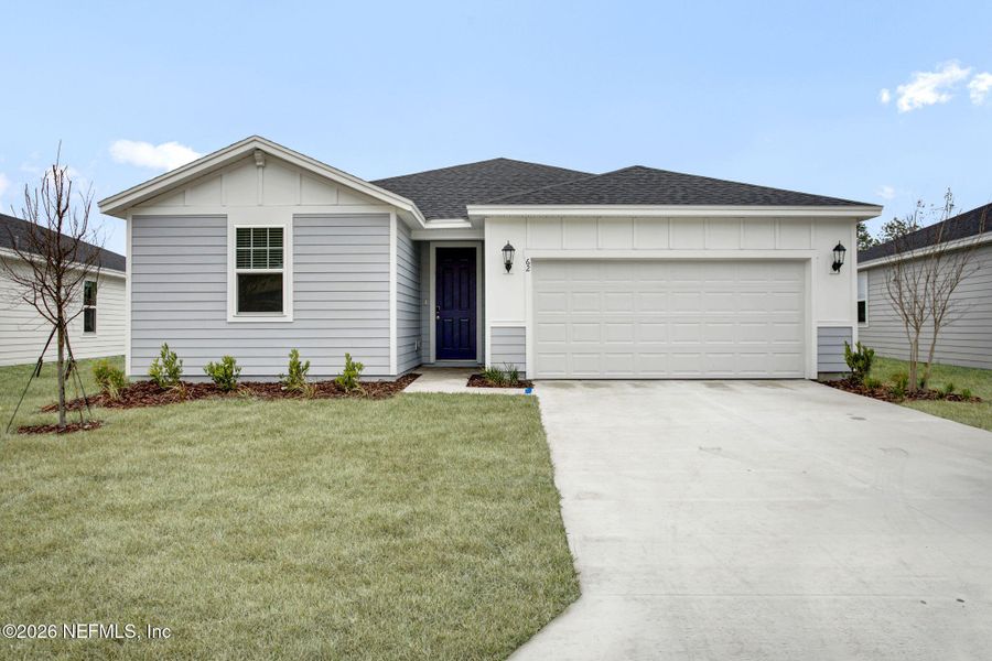 Front exterior of a new home in , Palm Coast, FL, highlighting curb appeal (Image 17). Front exterior of a new home in , Palm Coast, FL, highlighting curb appeal (Image 17).