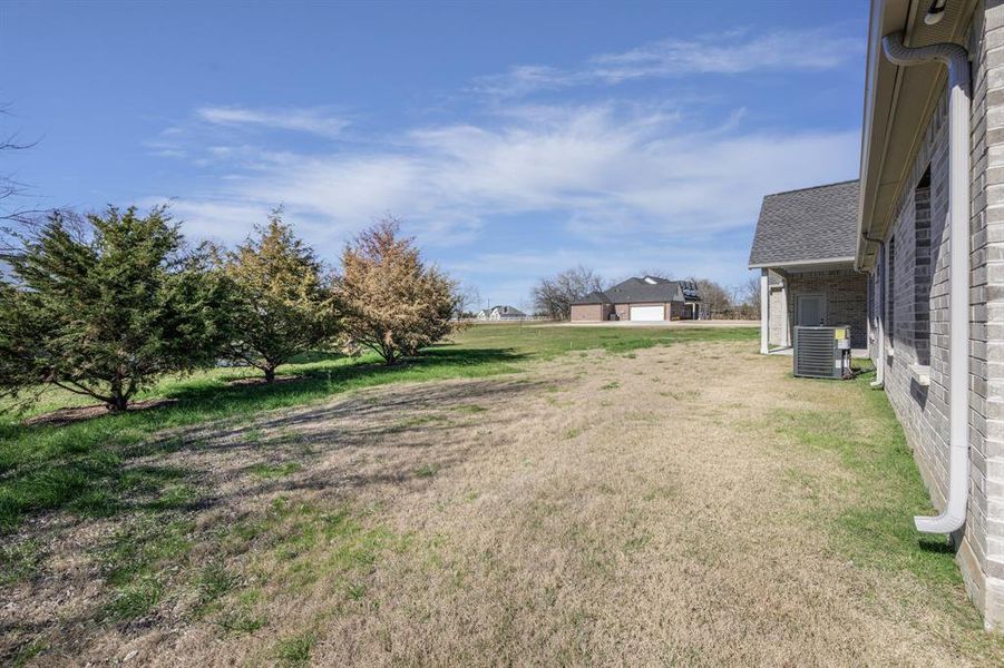 Exterior details and patio area of a home in , Farmersville (Image 25).