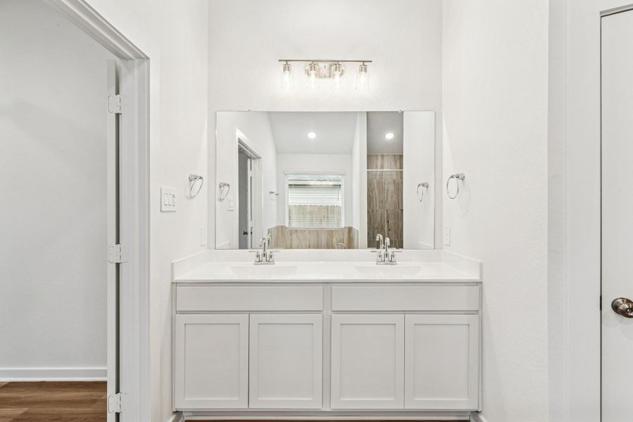 Furnished interior view inside a new home in Pinewood at Grand Texas, New Caney (Image 7). Furnished interior view inside a new home in Pinewood at Grand Texas, New Caney (Image 7).