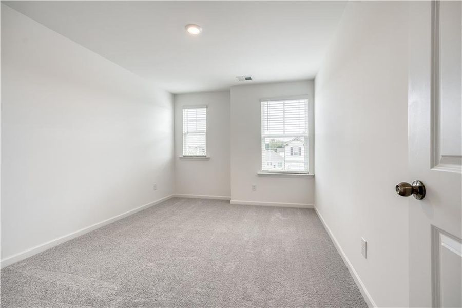Spacious, unfurnished interior of a new home in Watson Farms, Loganville (Image 21). Spacious, unfurnished interior of a new home in Watson Farms, Loganville (Image 21).