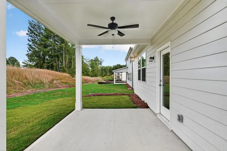 Exterior details and patio area of a home in Weatherfield, Buford (Image 3).