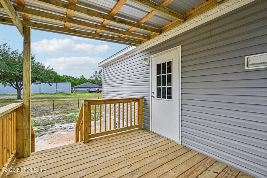 Exterior details and patio area of a home in , Starke (Image 24).