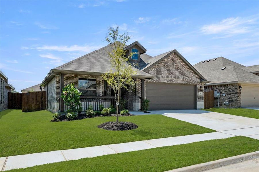 Front exterior of a new home in Chisholm Hills, Cleburne, TX, highlighting curb appeal (Image 23).