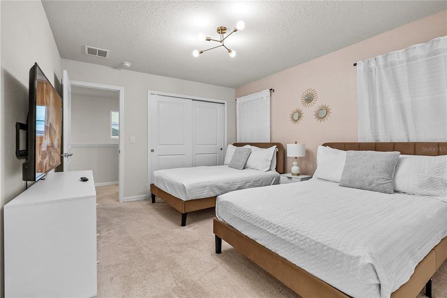 Furnished interior view inside a new home in Windsor Cay Resort, Clermont (Image 7).