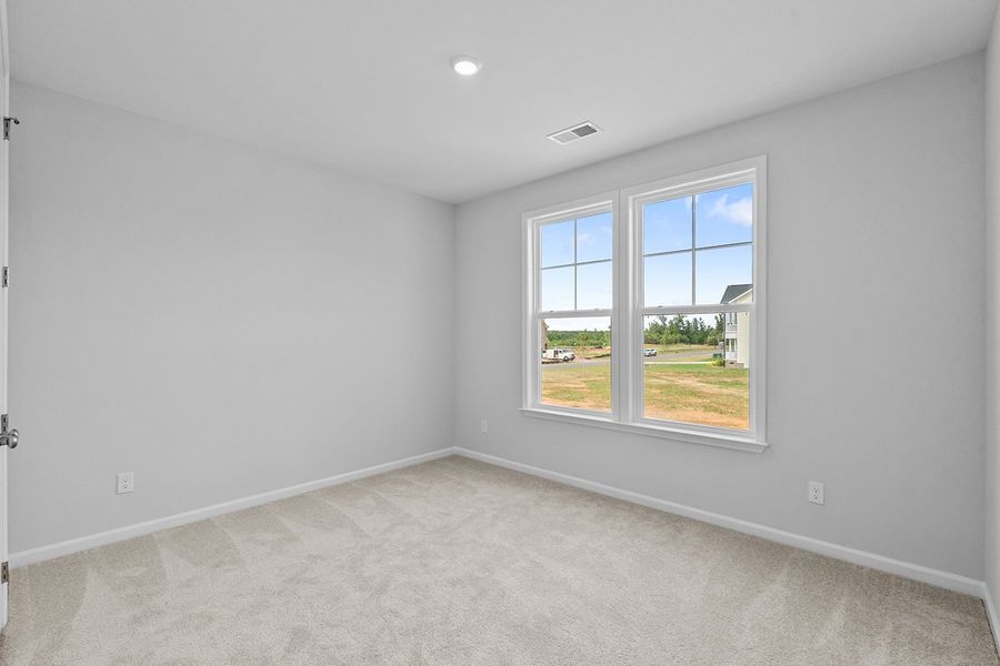 Spacious, unfurnished interior of a new home in Lilah Grove, Summerfield (Image 29).