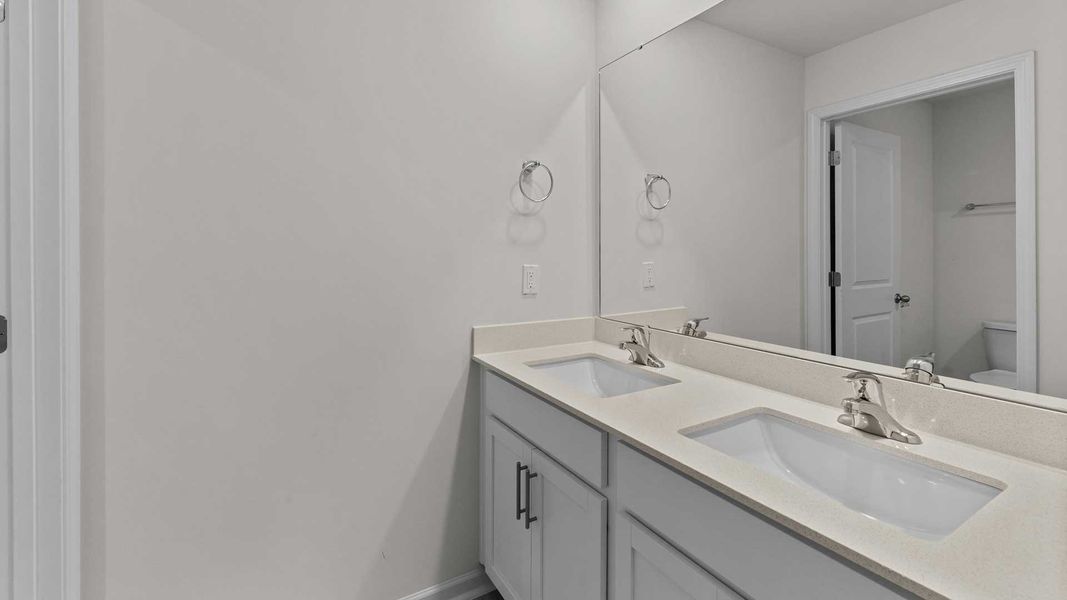 Furnished interior view inside a new home in Beaver Dam Crossing, Bailey (Image 10).