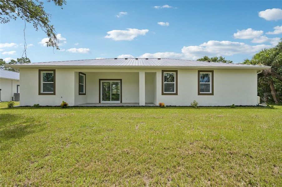 Front exterior of a new home in , North Port, FL, highlighting curb appeal (Image 22).