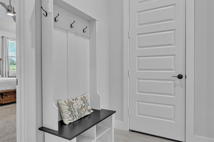 Built-in hall tree with storage bench and integrated coat hooks