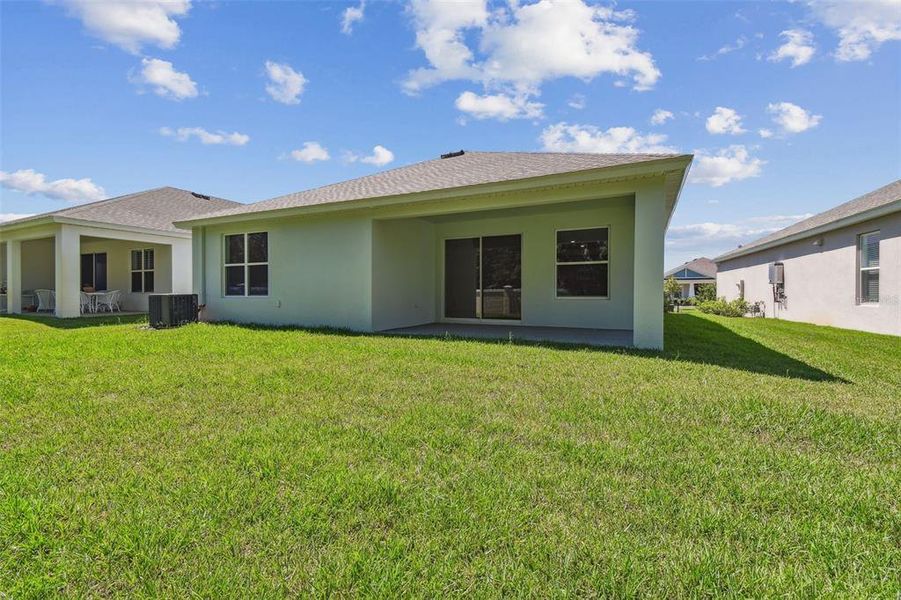 Front exterior of a new home in Cascades at Southern Hills, Brooksville, FL, highlighting curb appeal (Image 24).