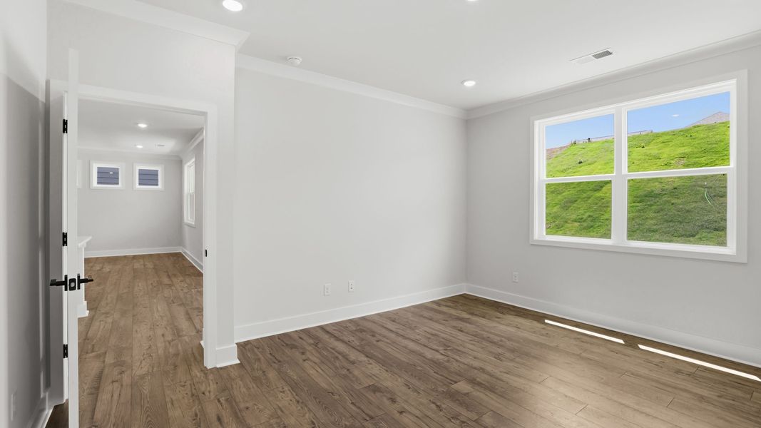 Spacious, unfurnished interior of a new home in Adams Glen, Greenville (Image 37).