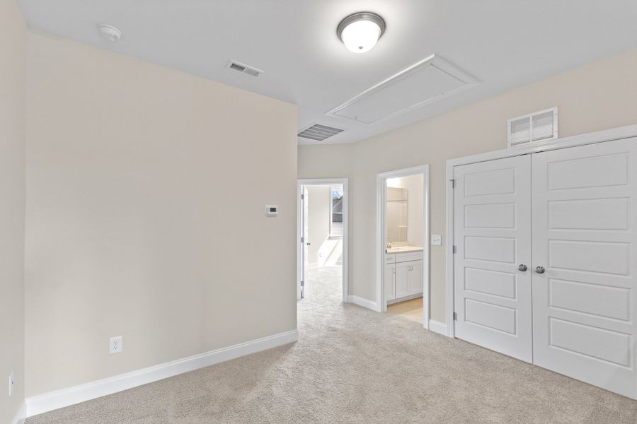 Representative unfurnished interior of a home built from the The Juniper by RobuckHomes in Kennebec Crossing, Angier (Image 100).
