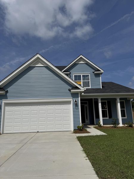 Front exterior of a new home in Oakley Pointe, Moncks Corner, SC, highlighting curb appeal (Image 23).