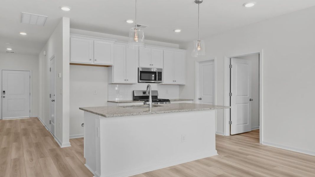 Furnished interior view inside a new home in Bluffs at Sun Colony, Longs (Image 8).