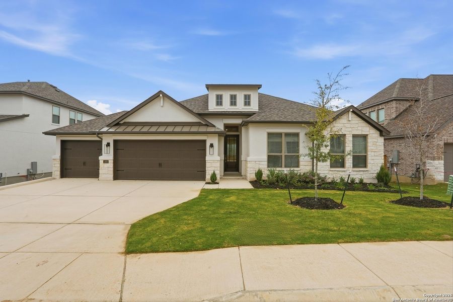 Front exterior of a new home in Kinder Ranch - 70', San Antonio, TX, highlighting curb appeal (Image 27).