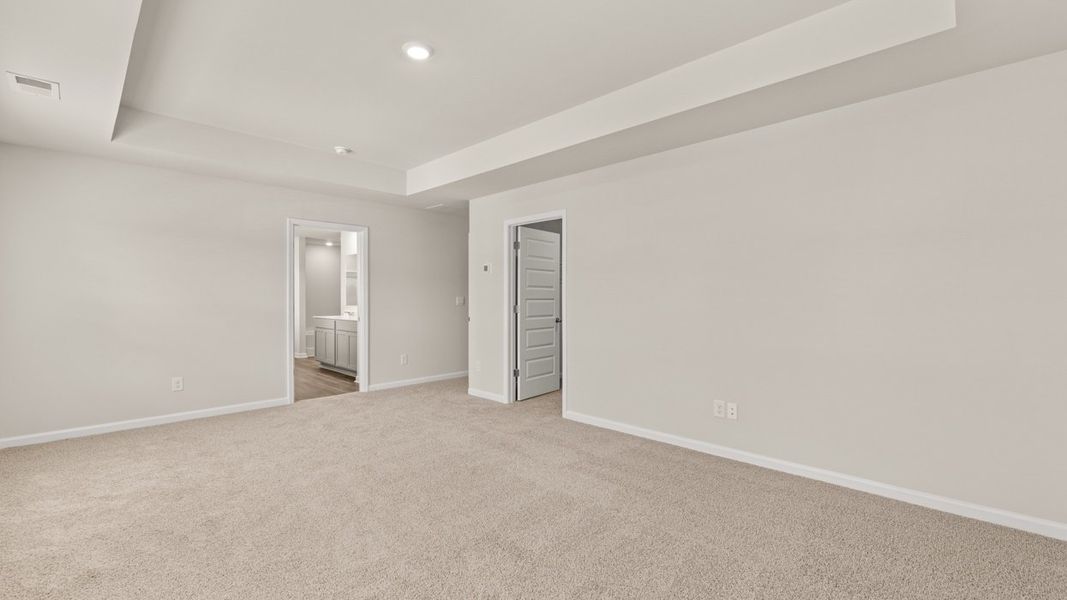 Spacious, unfurnished interior of a new home in The Reserve at Calcutta, Stockbridge (Image 21).