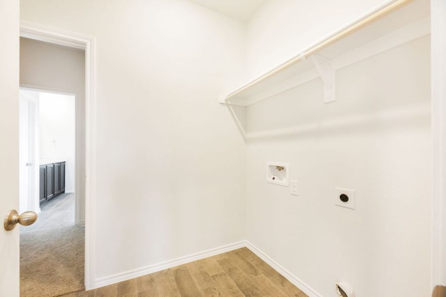 Representative exterior photo of a completed home built from the Lockhart by Impression Homes in Heartland, Heartland, TX (Image 27). Representative exterior photo of a completed home built from the Lockhart by Impression Homes in Heartland, Heartland, TX (Image 27).