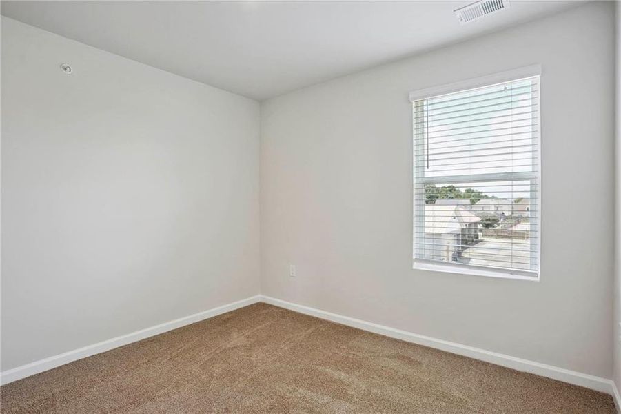 Spacious, unfurnished interior of a new home in The Enclave Townhomes, Hampton (Image 28).