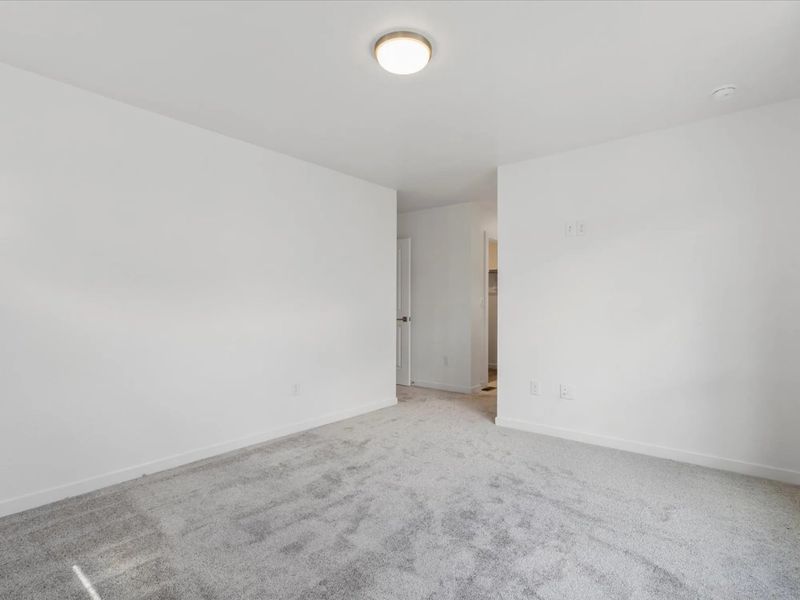 Spacious, unfurnished interior of a new home in The Commons at Victory Ridge, Colorado Springs (Image 7).