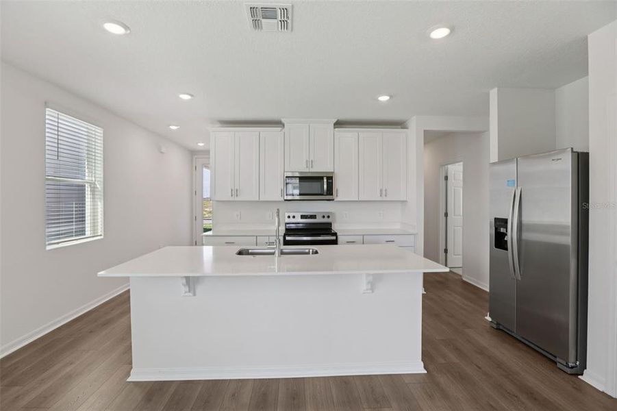 Furnished interior view inside a new home in Springs at Lake Alfred - Classic Series, Lake Alfred (Image 5).