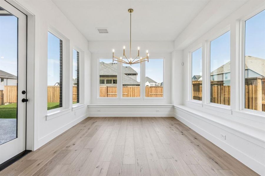 Grand dinner parties are in your future in this wonderful, light filled dining room!