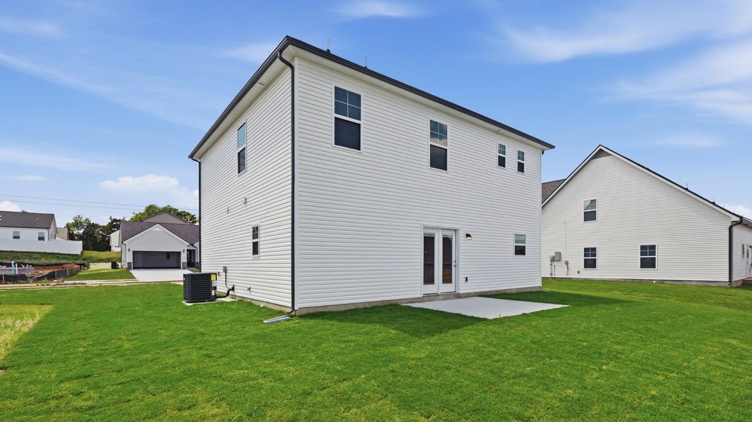 Exterior details and patio area of a home in Wheatfield, Shelbyville (Image 19).