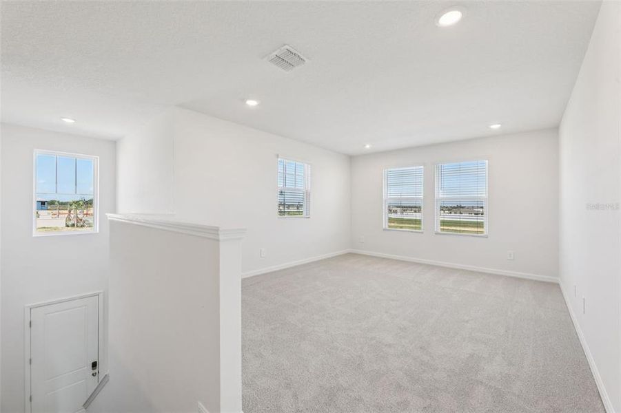 Spacious, unfurnished interior of a new home in Crosswinds - Signature Series, Haines City (Image 21).