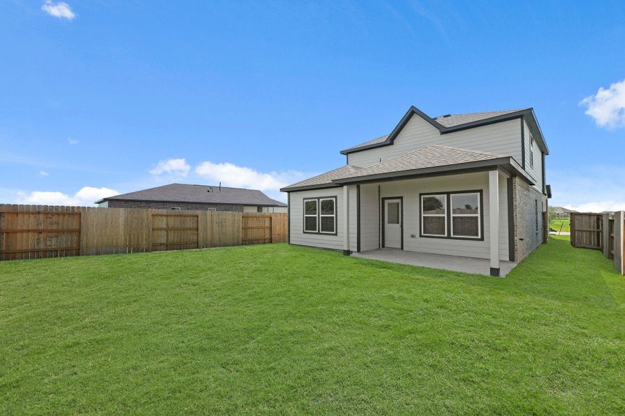 Exterior details and patio area of a home in River Ranch Trails, Dayton (Image 20).