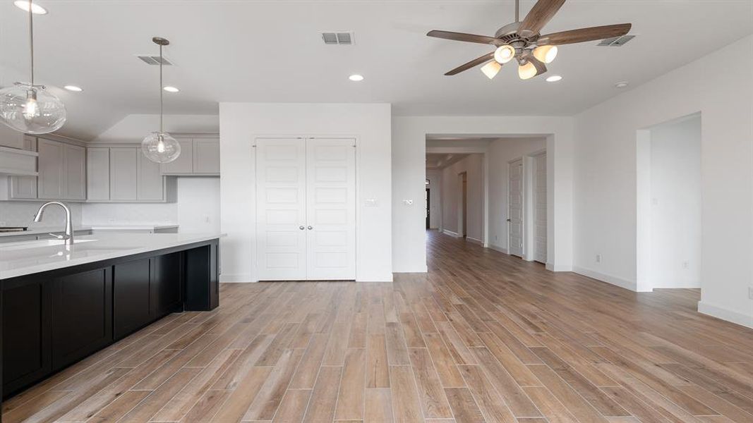 Spacious, unfurnished interior of a new home in Devonshire 55', Forney (Image 18).