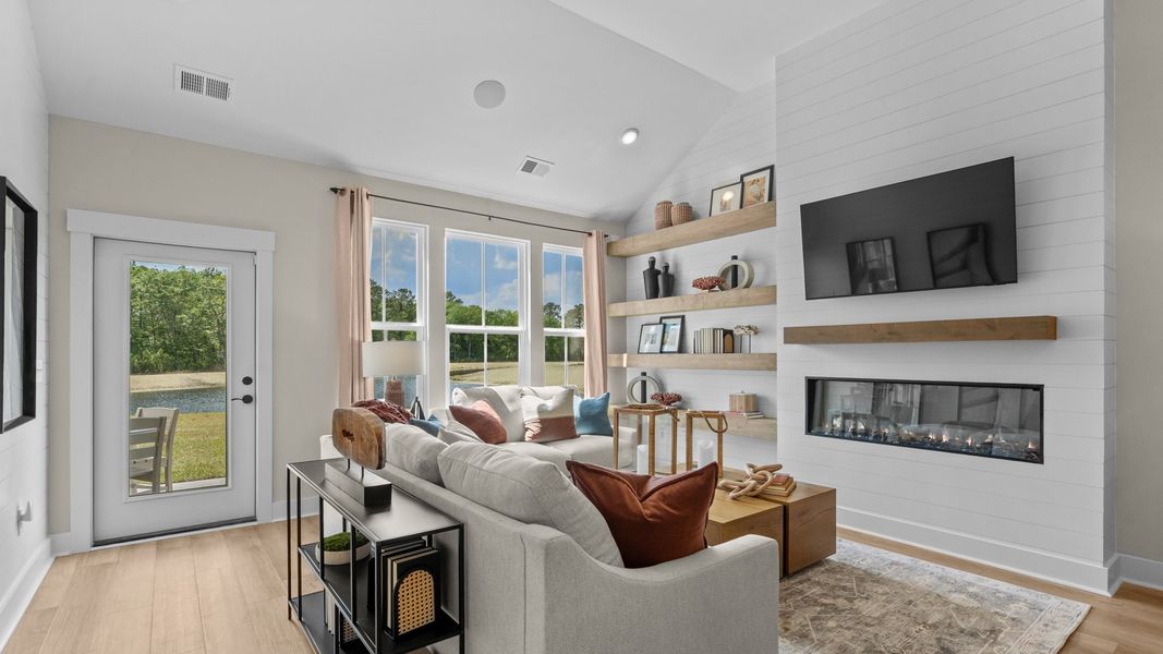 Spacious living room in the Summit home plan designed for gathering and relaxation.