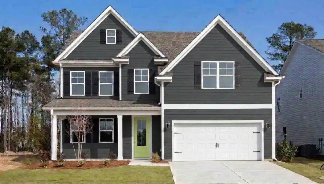 Front exterior of a new home in Surfside Landing, Hubert, NC, highlighting curb appeal (Image 1). Front exterior of a new home in Surfside Landing, Hubert, NC, highlighting curb appeal (Image 1).
