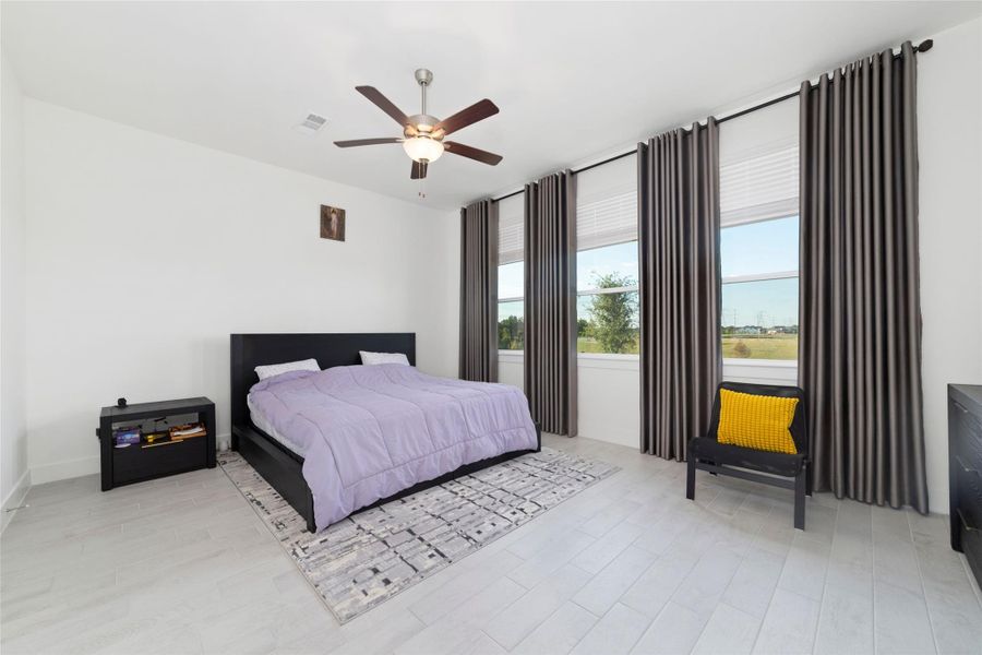 Furnished interior view inside a new home in Bridgeland 45's, Cypress (Image 11).