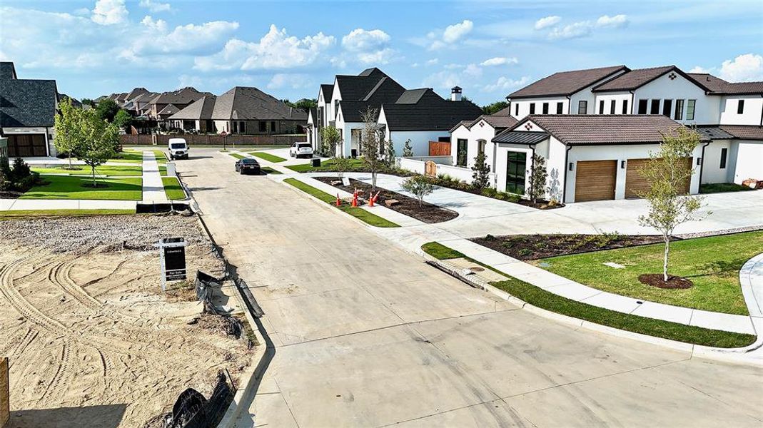 Front exterior of a new home in , Trophy Club, TX, highlighting curb appeal (Image 6). Front exterior of a new home in , Trophy Club, TX, highlighting curb appeal (Image 6).