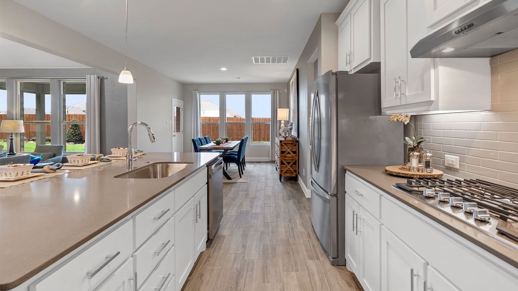 Representative furnished interior of a home built from the Wimberley by D.R. Horton in Lakeview Pointe, Grand Prairie (Image 9).