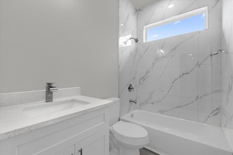 Furnished interior view inside a new home in , Dunnellon (Image 11).