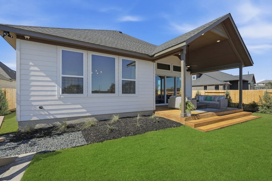 Exterior details and patio area of a home in Prominence, San Antonio (Image 31).