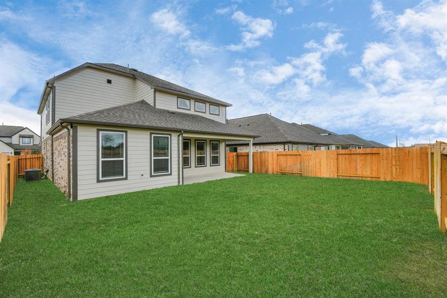 Come and see this spacious backyard with its beautiful covered patio. There is plenty of room for the kids to play and adults to relax. Perfect for your outdoor living space, patio furniture, bbq pit, and so much more. The possibilities are endless!