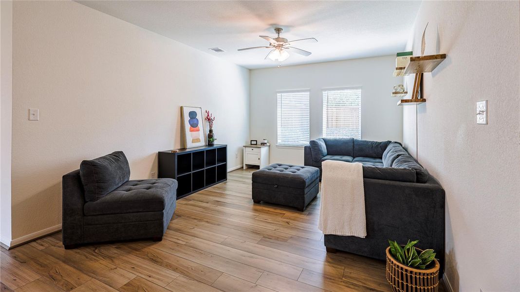 Furnished interior view inside a new home in Woodshore, Clute (Image 8).