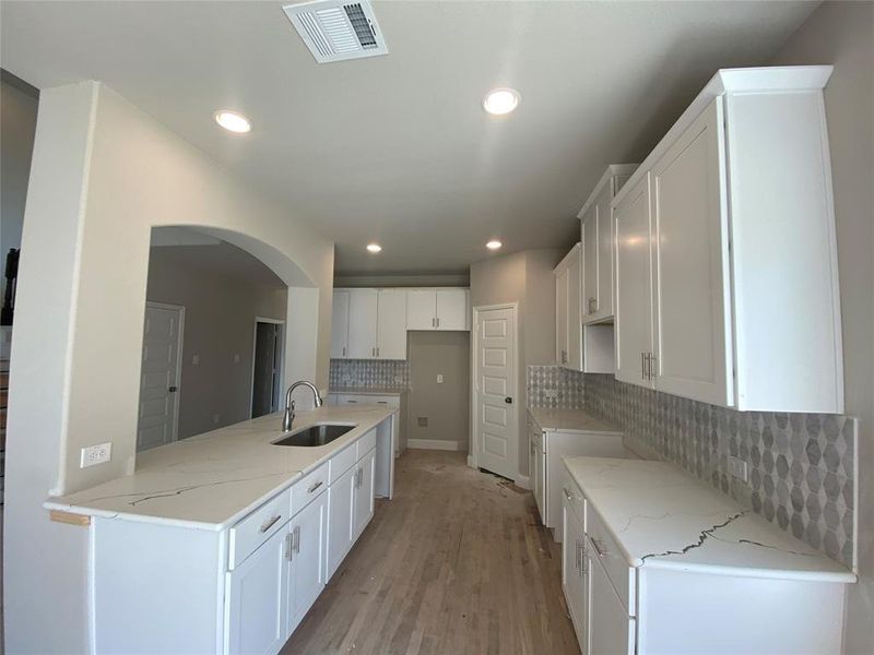 Open, light & bright kitchen open to great room.