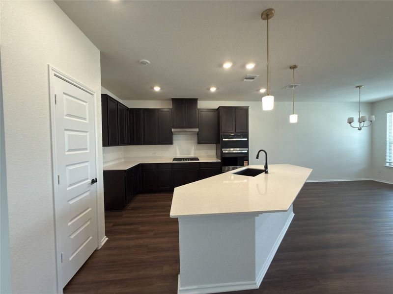 Furnished interior view inside a new home in River Bluff, Leander (Image 9).