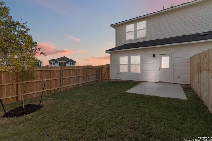 Exterior details and patio area of a home in Abbott Run, San Antonio (Image 22).