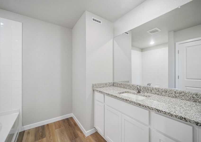 The secondary bathroom has a tub/shower combo.