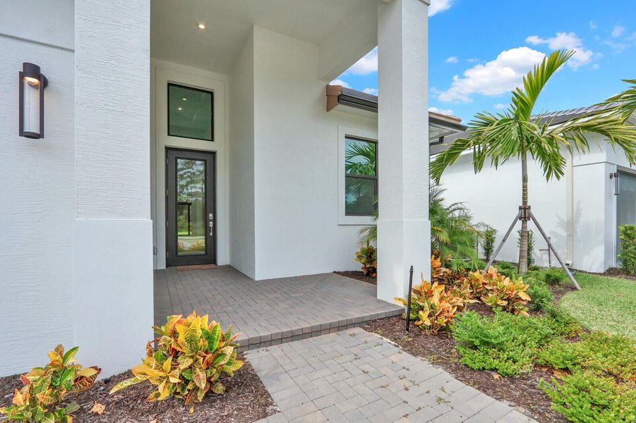 Exterior details and patio area of a home in Cove Royale, Stuart (Image 19).