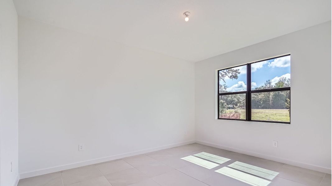 Representative unfurnished interior of a home built from the Cali by D.R. Horton in Twin Oaks, Stuart (Image 14).