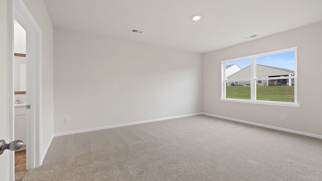 Spacious, unfurnished interior of a new home in Durbin Meadows Traditions, Fountain Inn (Image 28).