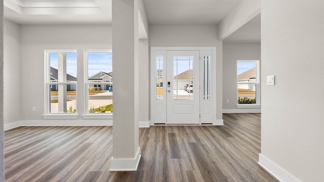 Representative unfurnished interior of a home built from the The Mckenzie by D.R. Horton in Liberty, Panama City (Image 15).