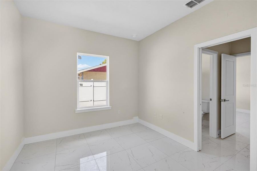 Spacious, unfurnished interior of a new home in , Port Charlotte (Image 26).