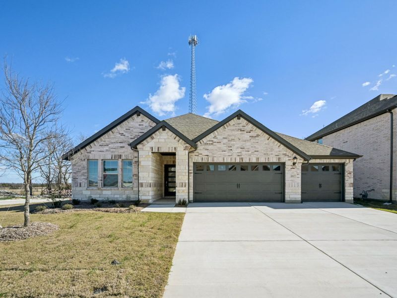 Front exterior of a new home in Parks at Foster Crossing - Premier Series, Anna, TX, highlighting curb appeal (Image 1). Front exterior of a new home in Parks at Foster Crossing - Premier Series, Anna, TX, highlighting curb appeal (Image 1).