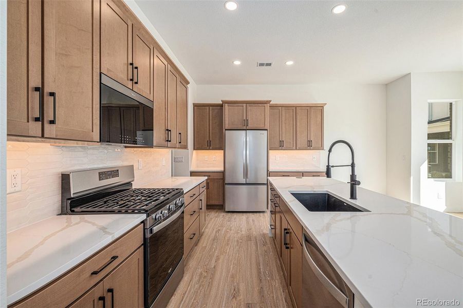 Furnished interior view inside a new home in Prelude at TAVA Waters, Denver (Image 11).