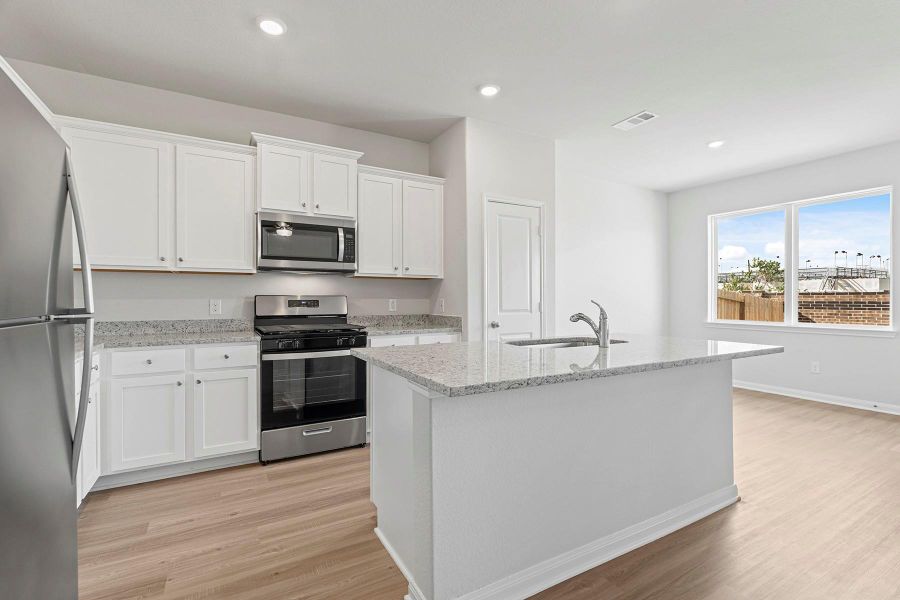 Furnished interior view inside a new home in Canterra Creek, Iowa Colony (Image 4).