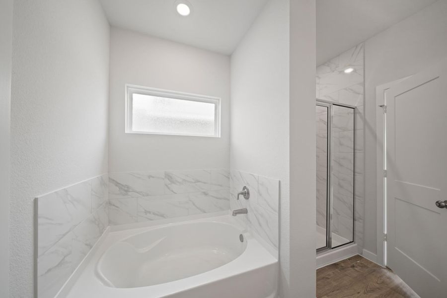 Furnished interior view inside a new home in Sunterra, Katy (Image 8).